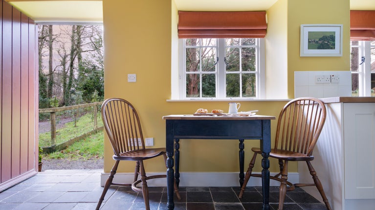 The table for two in the living space at Cariad Cottage, Carmarthenshire